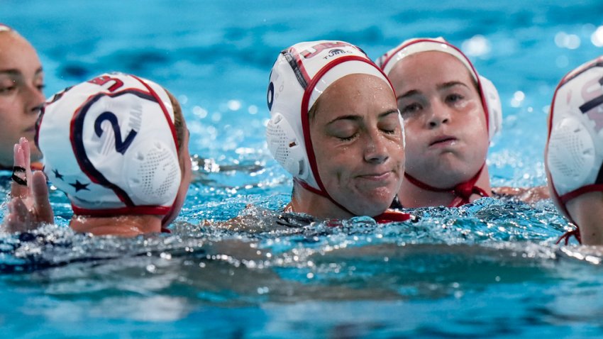 United States’ players react after loosing the women’s bronze medal water polo match against Netherlands at the 2024 Summer Olympics, Saturday, Aug. 10, 2024, in Paris, France. (AP Photo/Luca Bruno)