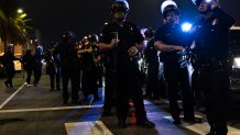 Los Angeles, CA - June 06: Law enforcement officers work to clear protesters in downtown  on Friday, June 6, 2025 in Los Angeles, CA. (Luke Johnson / Los Angeles Times via Getty Images)