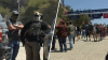 Federal agents denied entry to Dodger Stadium parking lots, team says