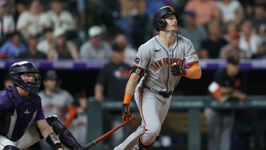DENVER, COLORADO – JUNE 10: Mike Yastrzemski #5 of the San Francisco Giants hits a RBI single against the Colorado Rockies in the ninth inning at Coors Field on June 10, 2025 in Denver, Colorado. (Photo by Matthew Stockman/Getty Images)